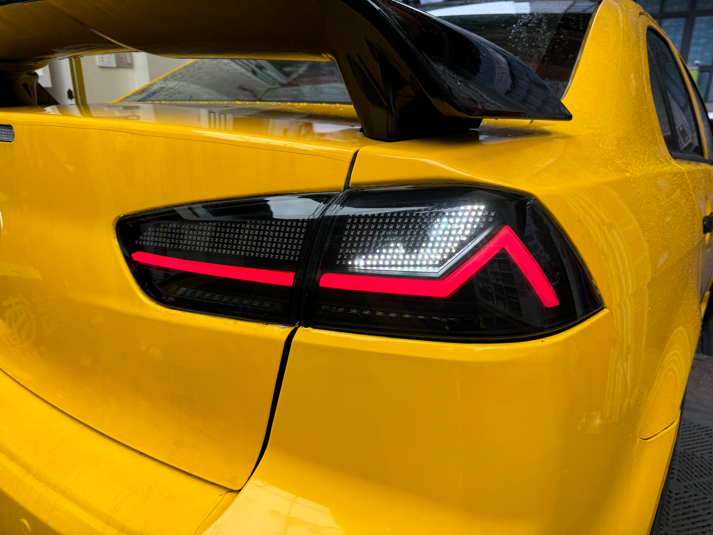 “Autoglo Australia RGB LED Tail Lights for Mitsubishi Lancer 2007–2018 with start-up animation and smoked lens”