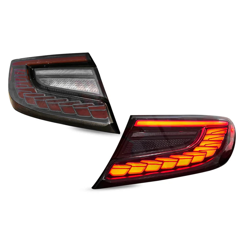 Red Lens Full LED Dragon Scale Taillights for 2021-2024 Toyota GR86 and Subaru BRZ, featuring a unique dragon scale design with bright red brake lights, dynamic amber sequential turn signals, and full LED DRLs for enhanced visibility and a modern, stylish appearance