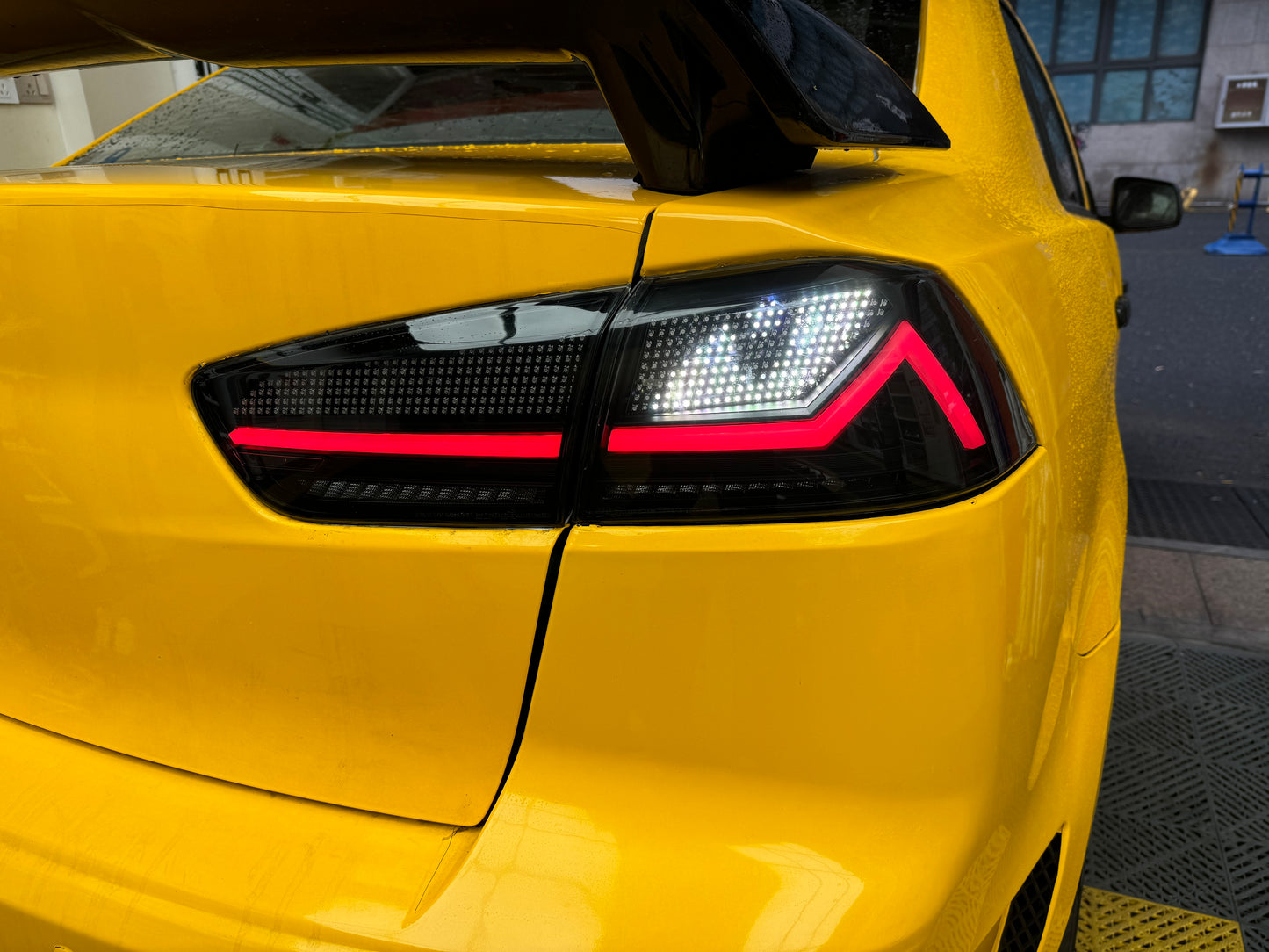 “Autoglo Australia RGB LED Tail Lights for Mitsubishi Lancer 2007–2018 with start-up animation and smoked lens”