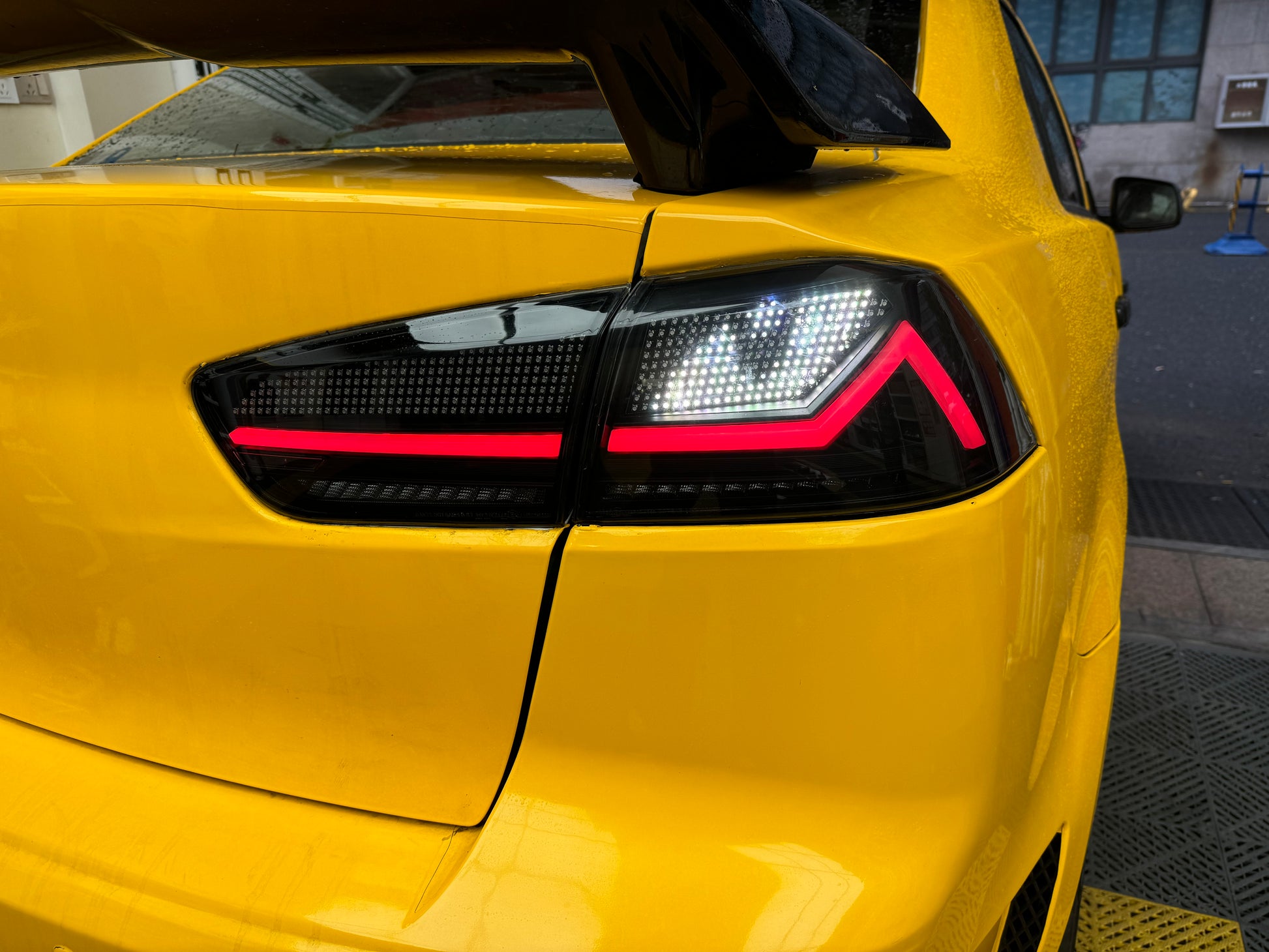 “Autoglo Australia RGB LED Tail Lights for Mitsubishi Lancer 2007–2018 with start-up animation and smoked lens”